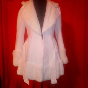 Half white fluffy winter coat with gold buckle.